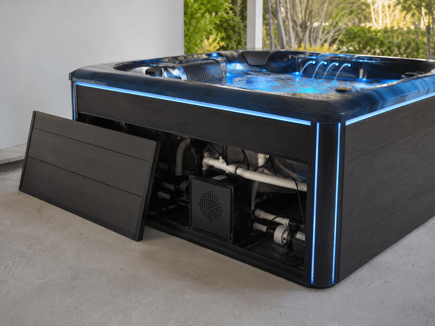 Bellagio hot tub with integrated Bluetooth audio during a relaxed backyard evening